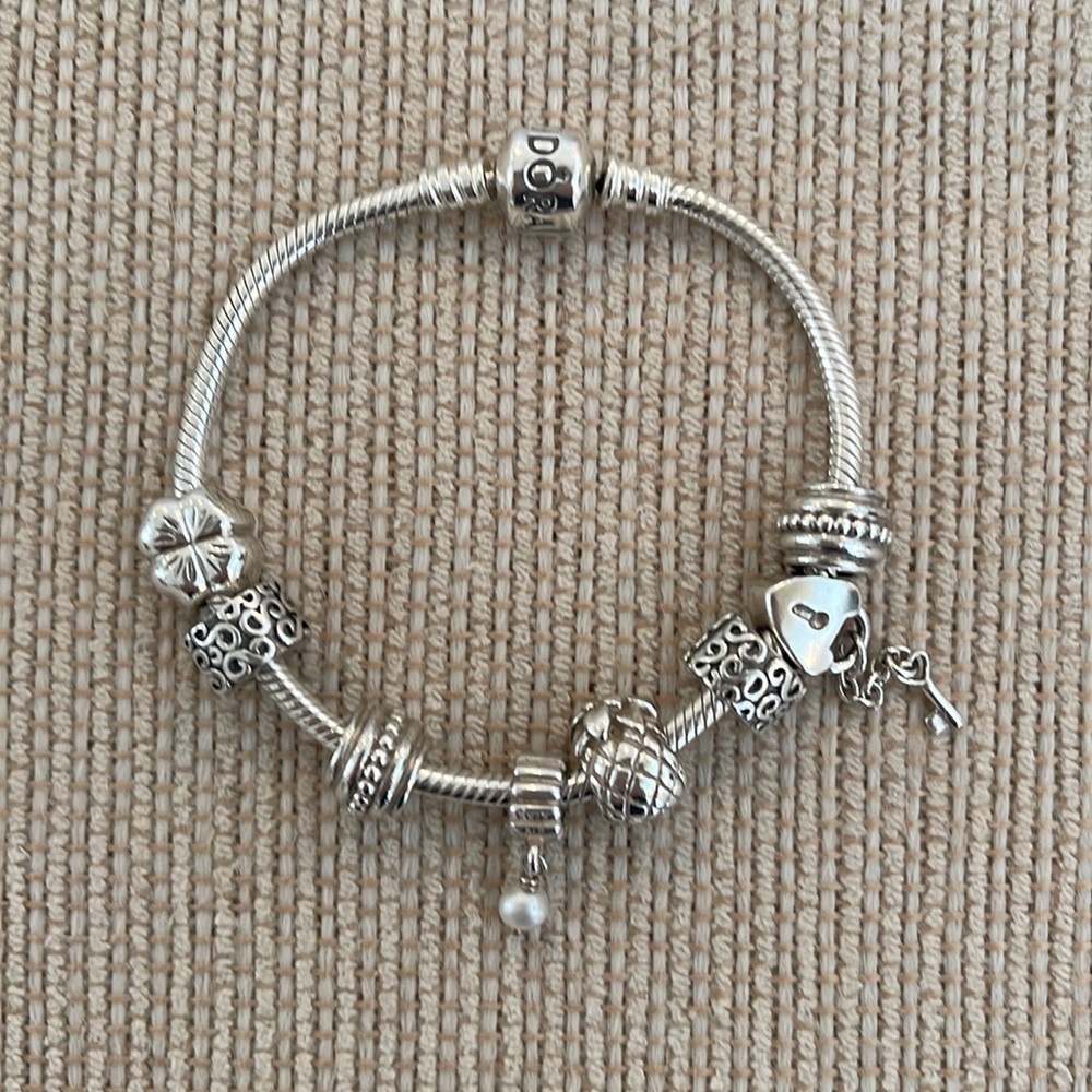 Pandora sterling silver charm bracelet. Authentic